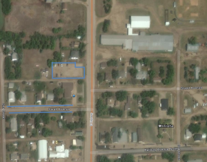 Aerial view of the Mid-West Planning District office building and parking on Sarah Avenue and the parking lot to the north.